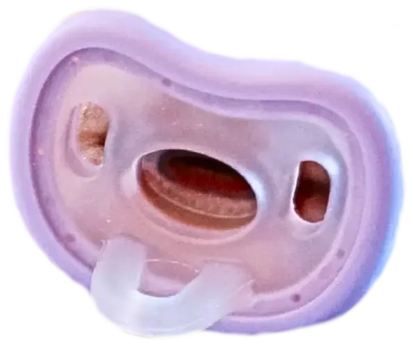 close up of the ergonomic, safe base of the calm and clean pacifier toothbrush from froglily